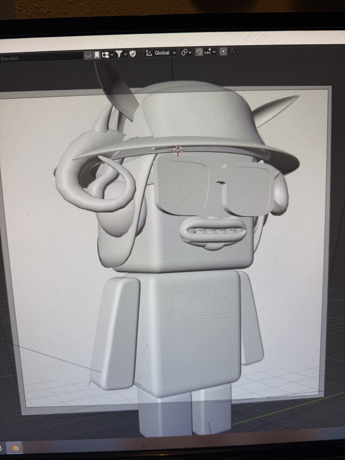 Work-in-progress Stock Wick sculpt in Blender with a horned hat, headphones, and glasses